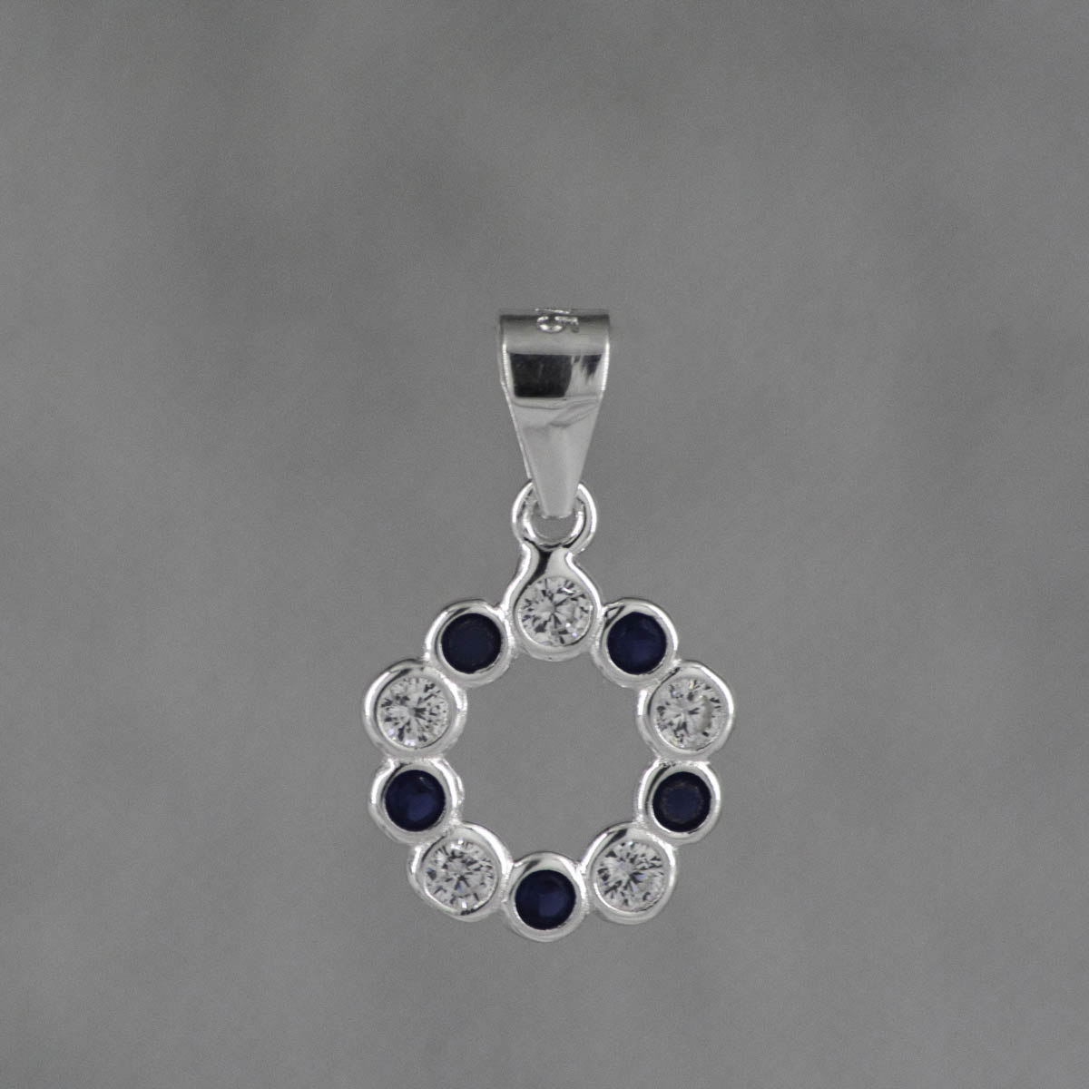 DIJE SILUETA CIRCULO CRISTALES